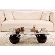 Golvende salontafel grijs getint glas zwarte bolpoten Noxa 120x80 cm